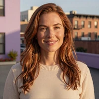 Adrienne D., a verified amputee dating app member, smiling in her Brooklyn loft